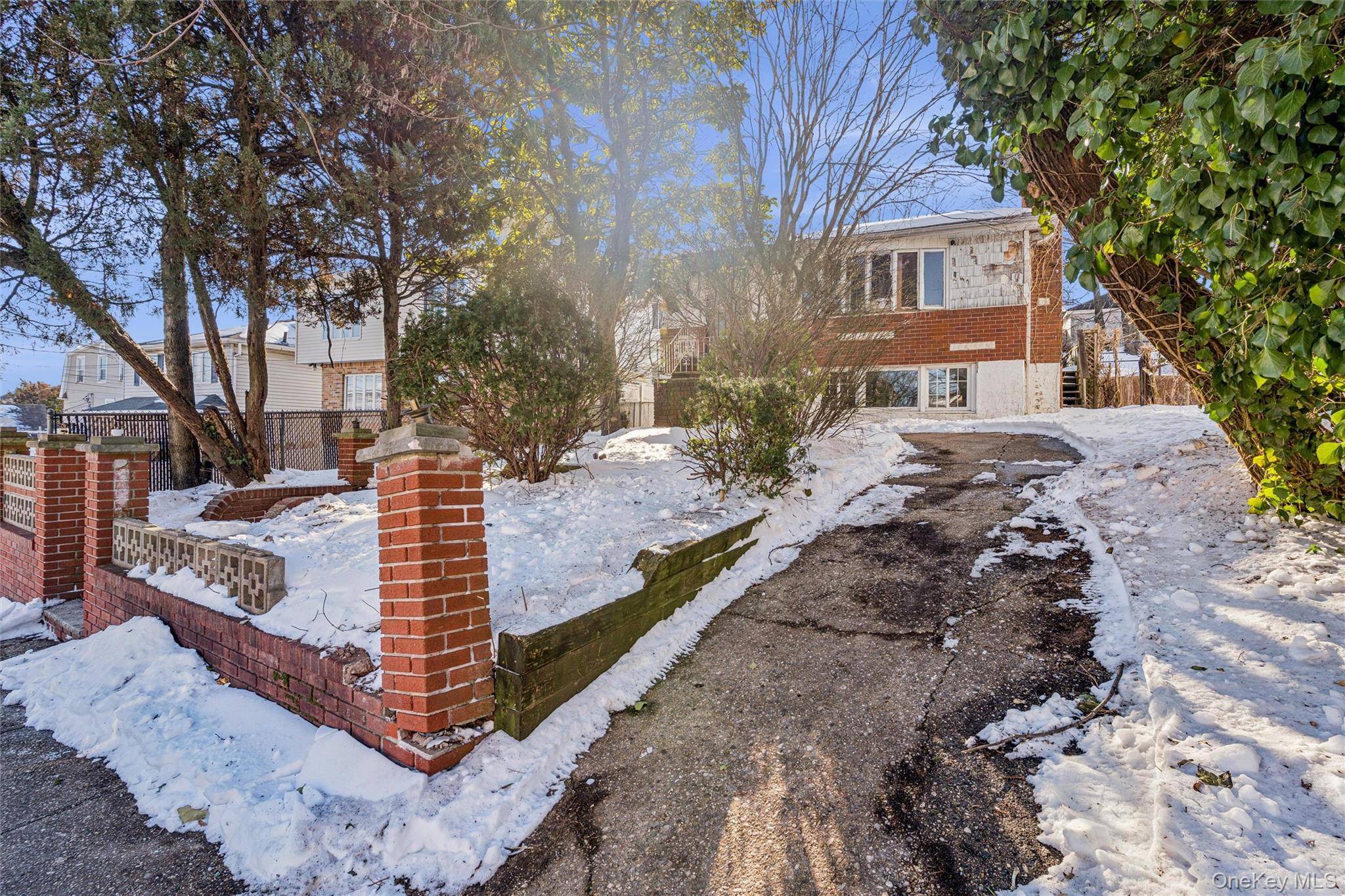 Staten Island hi ranch situated on an oversized 40x123 lot.