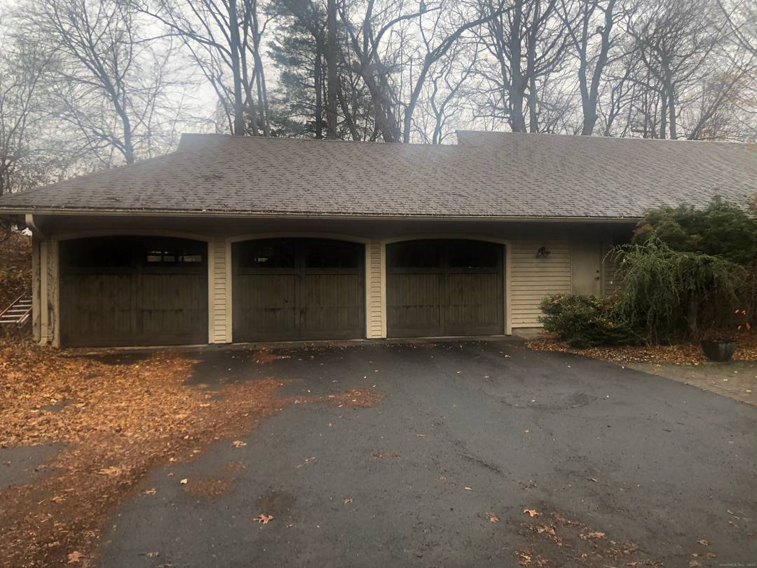 Escape to your own private resort at 40 Ferncliff Drive a stunning contemporary ranch set on 1.