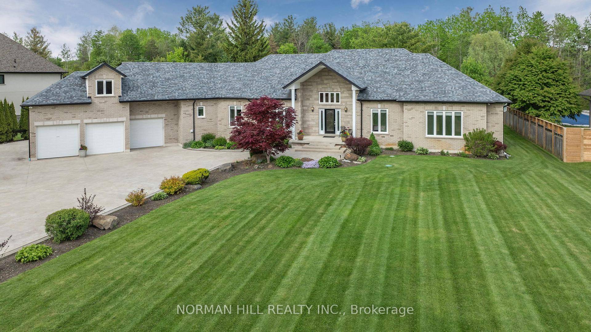 Executive 4 Bedroom Custom Built Bungalow Nestled On A Picturesque 2.