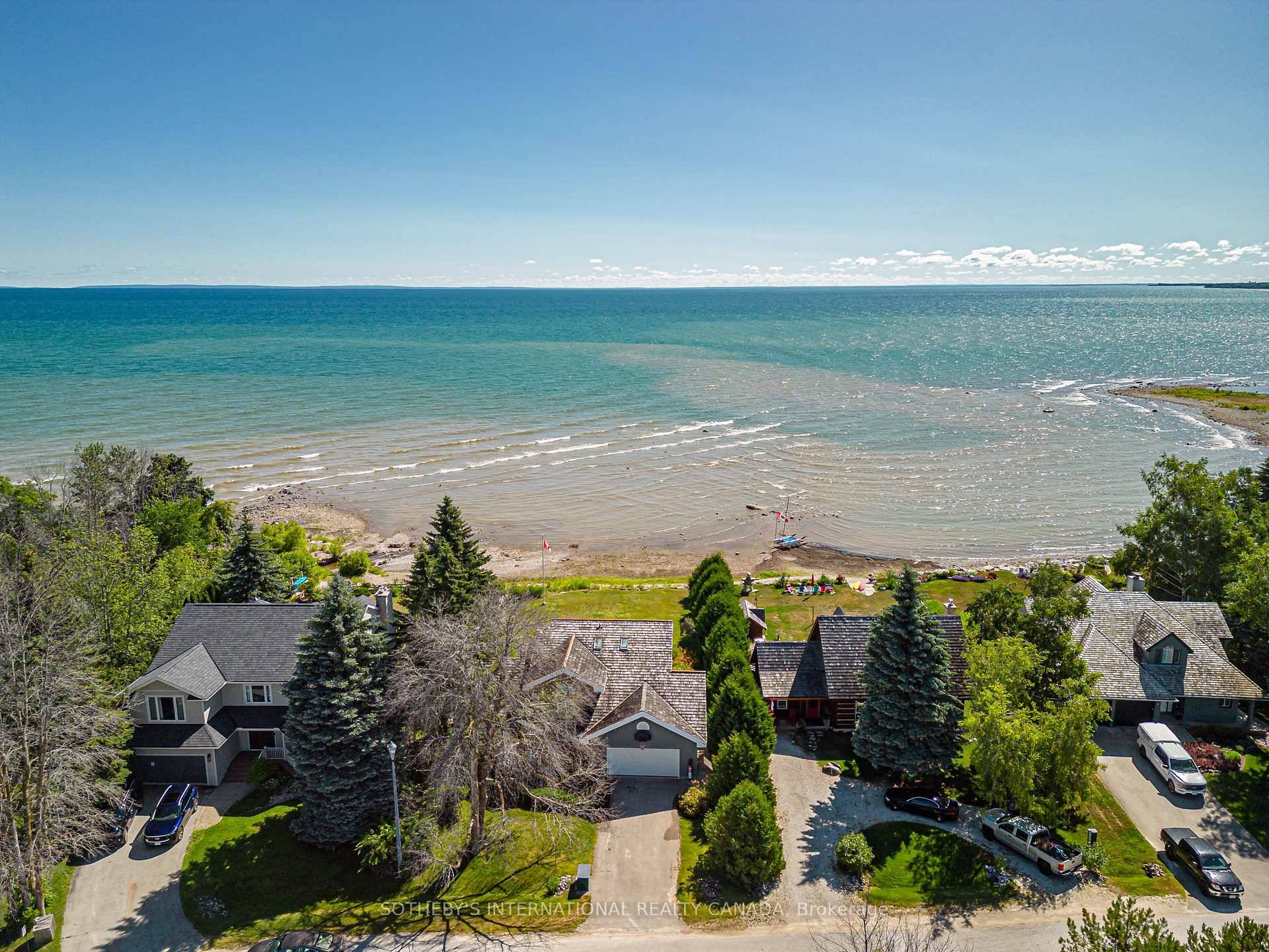 Welcome to 76 feet of pristine Georgian Bay shoreline, nestled in the exclusive enclave ofFieldcrest Court, where breathtaking sunrises and sunsets frame each day.