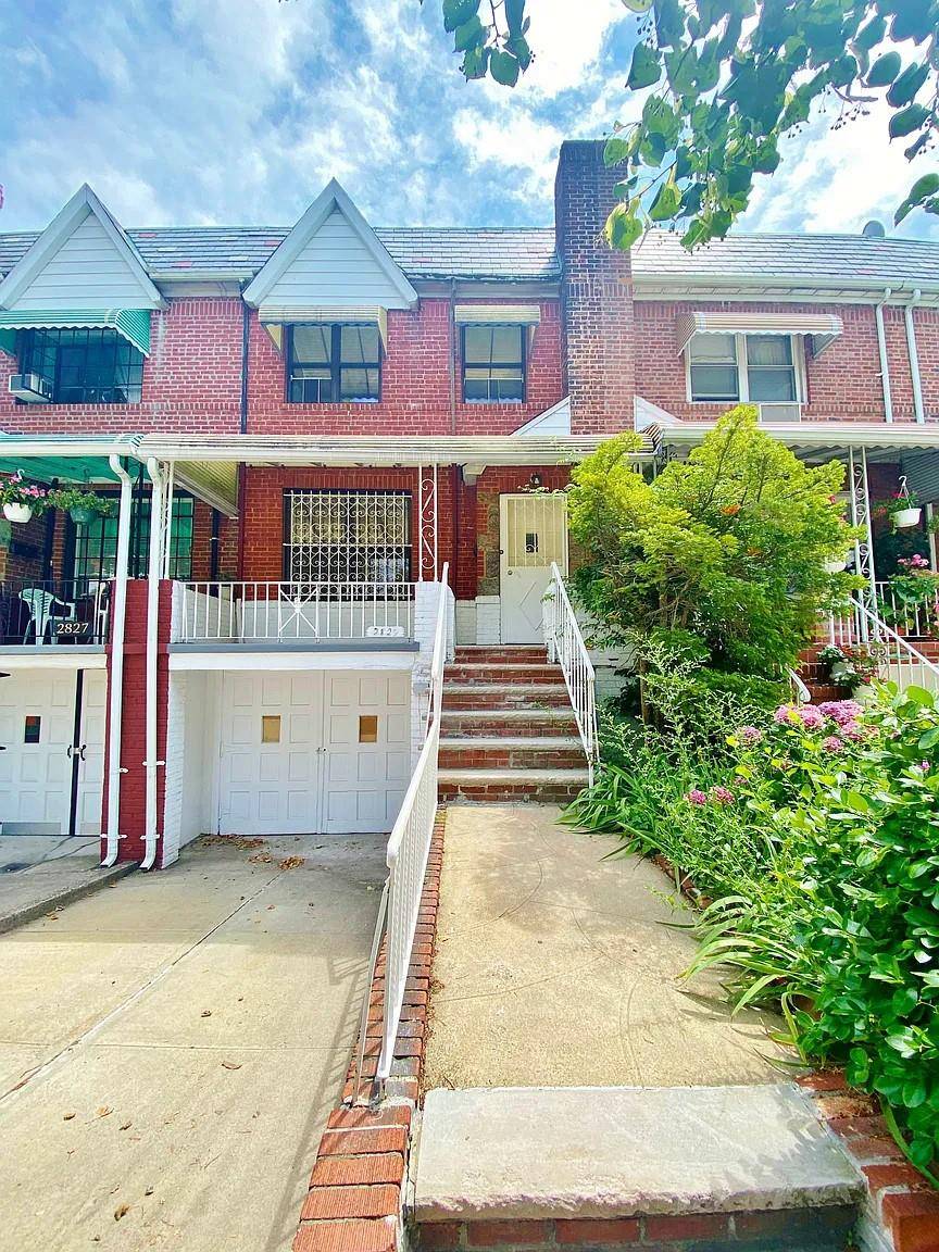 Completely renovated 3 Bedroom duplex home with a finished street level walk out basement.