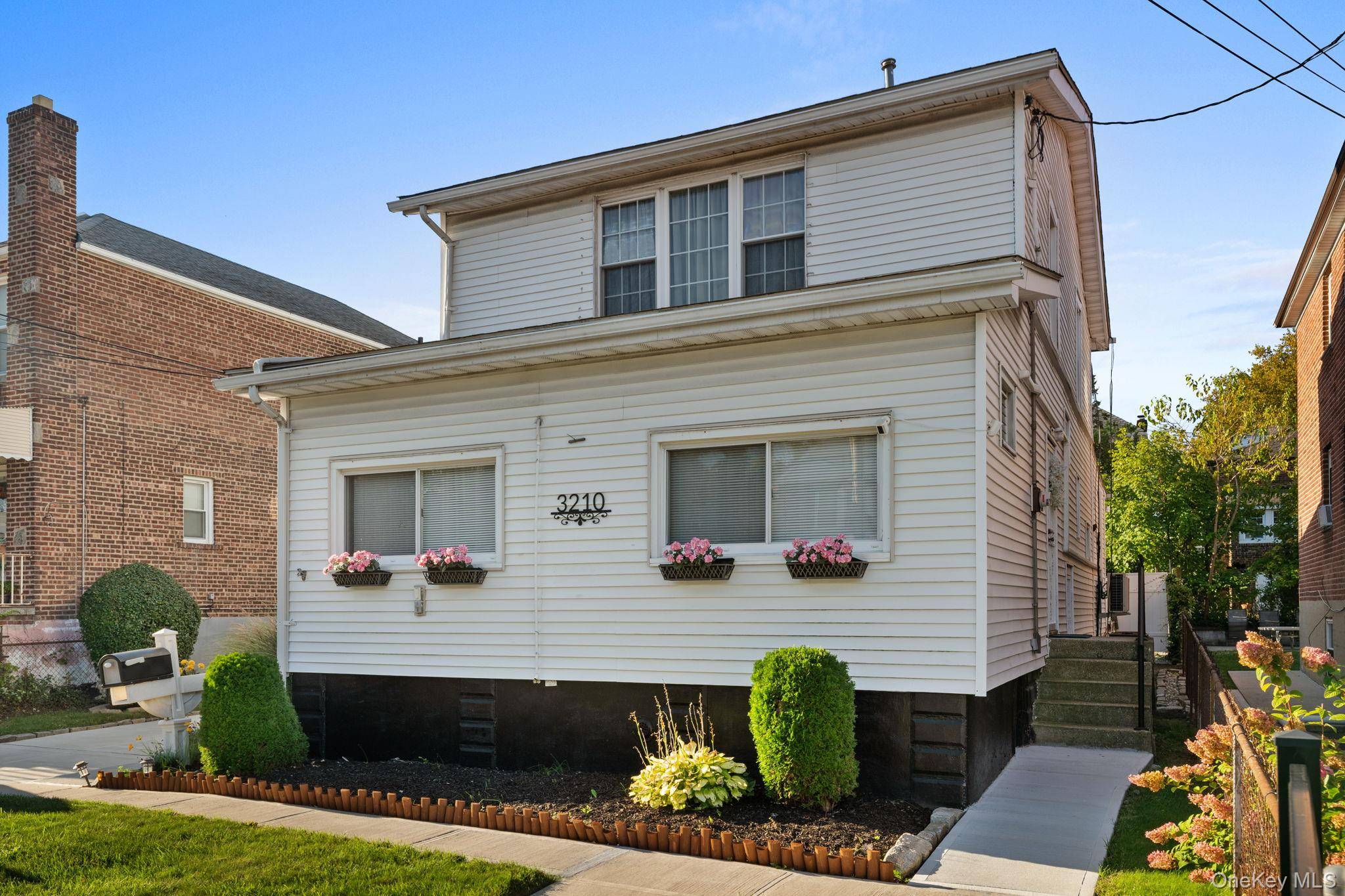Welcome to this lovingly maintained and beautifully upgraded two family home in the desirable Country Club neighborhood a rare find offering comfort, space, and flexibility for today s lifestyle.