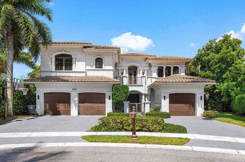 Welcome to 17895 Cadena Drive, a stunning lakefront estate in the heart of Boca Raton.