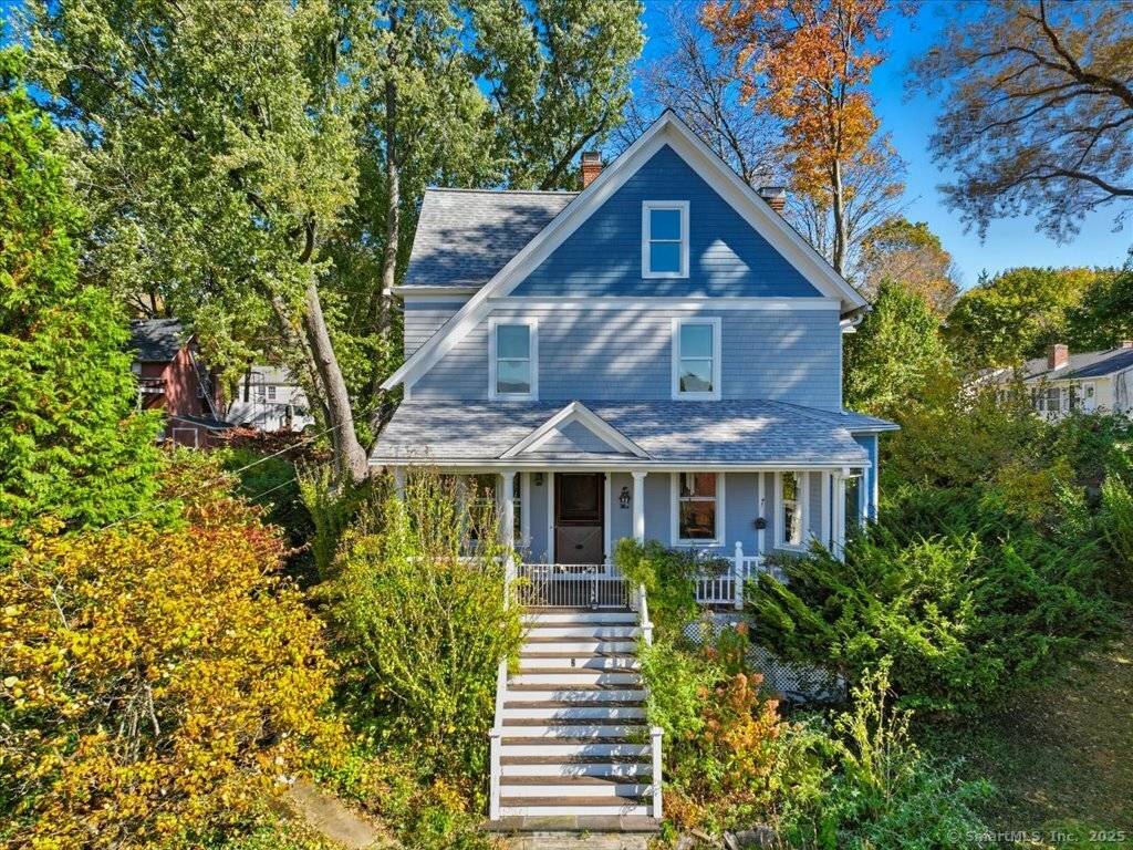Welcome to this timeless 1907 Victorian, perched high above Crescent Street with enchanting views of Main Street and Keyboard Pond.