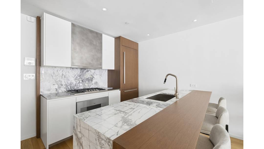 2C at 75 Kenmare This south facing one bedroom, one bath residence features a smartly crafted open living plan with white oak floors throughout, expansive floor to ceiling windows and ...