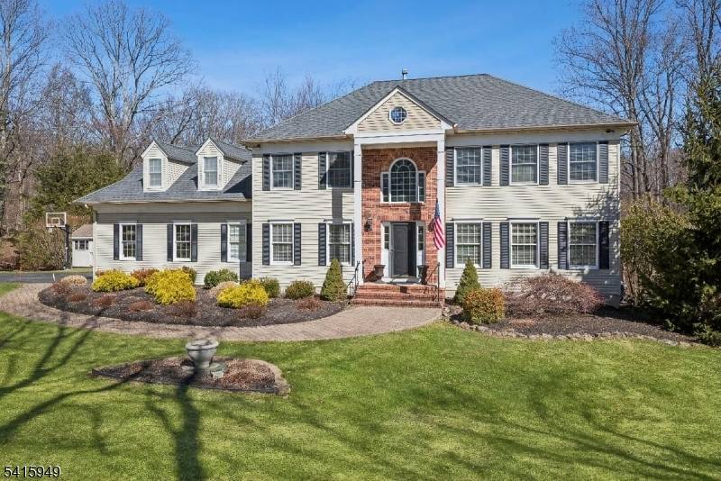 Tucked at the end of a quiet cul de sac in one of Chester Township's most desirable neighborhoods, this exceptional Colonial is set on 5 private acres, offering a combination ...