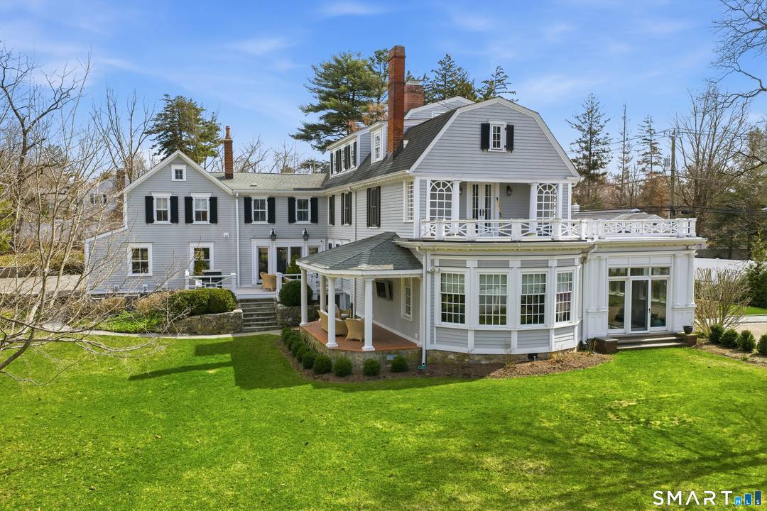 Step into a rare offering that beautifully captures the essence of classic New England living a stately 1880s residence set in one of the Gold Coast's most desirable towns.