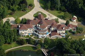 50 Poplar Hill Drive is a 50, 000 square feet masterpiece consisting of 19 bedrooms, 25 bathrooms, an indoor pool and hot tub, a night club, casino, an indoor racquetball ...