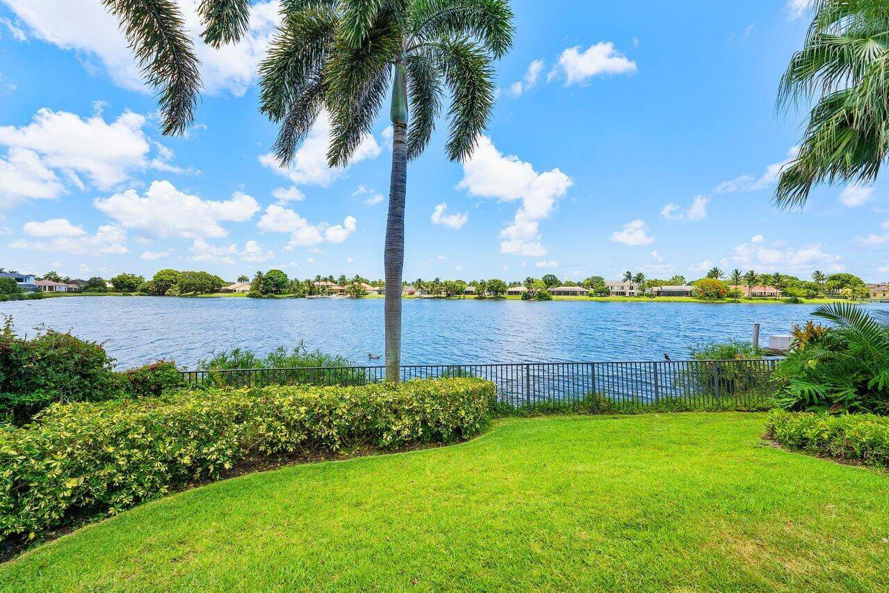 This exceptional lakeside estate blends sophistication, comfort, and timeless design.