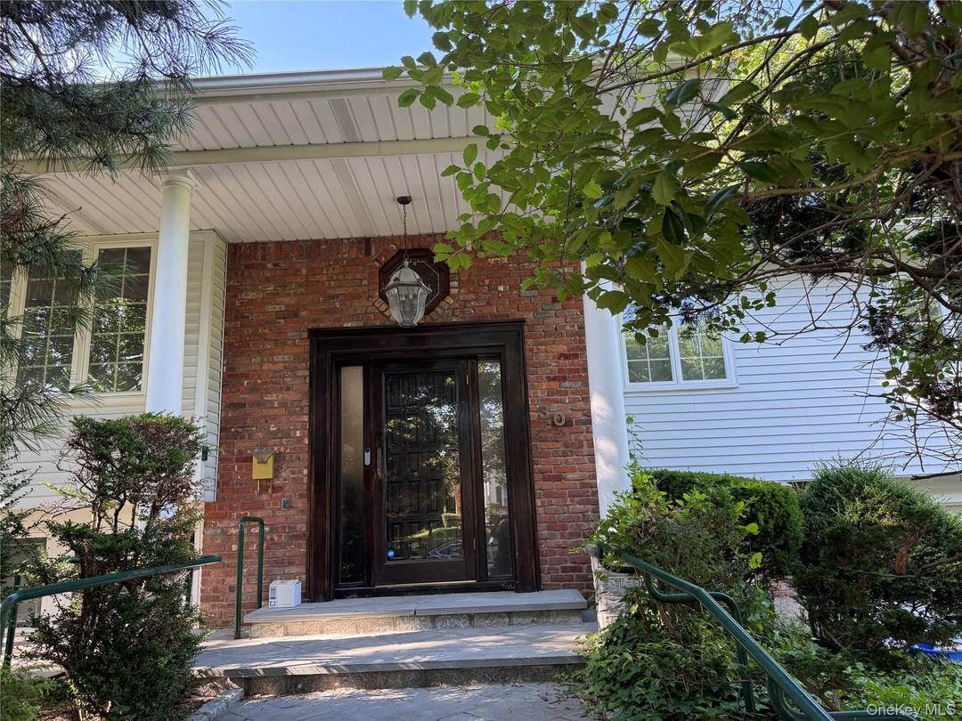 Welcome to this extraordinarily large residence, boasting an impressive stone and brick pillars lighted entryway.