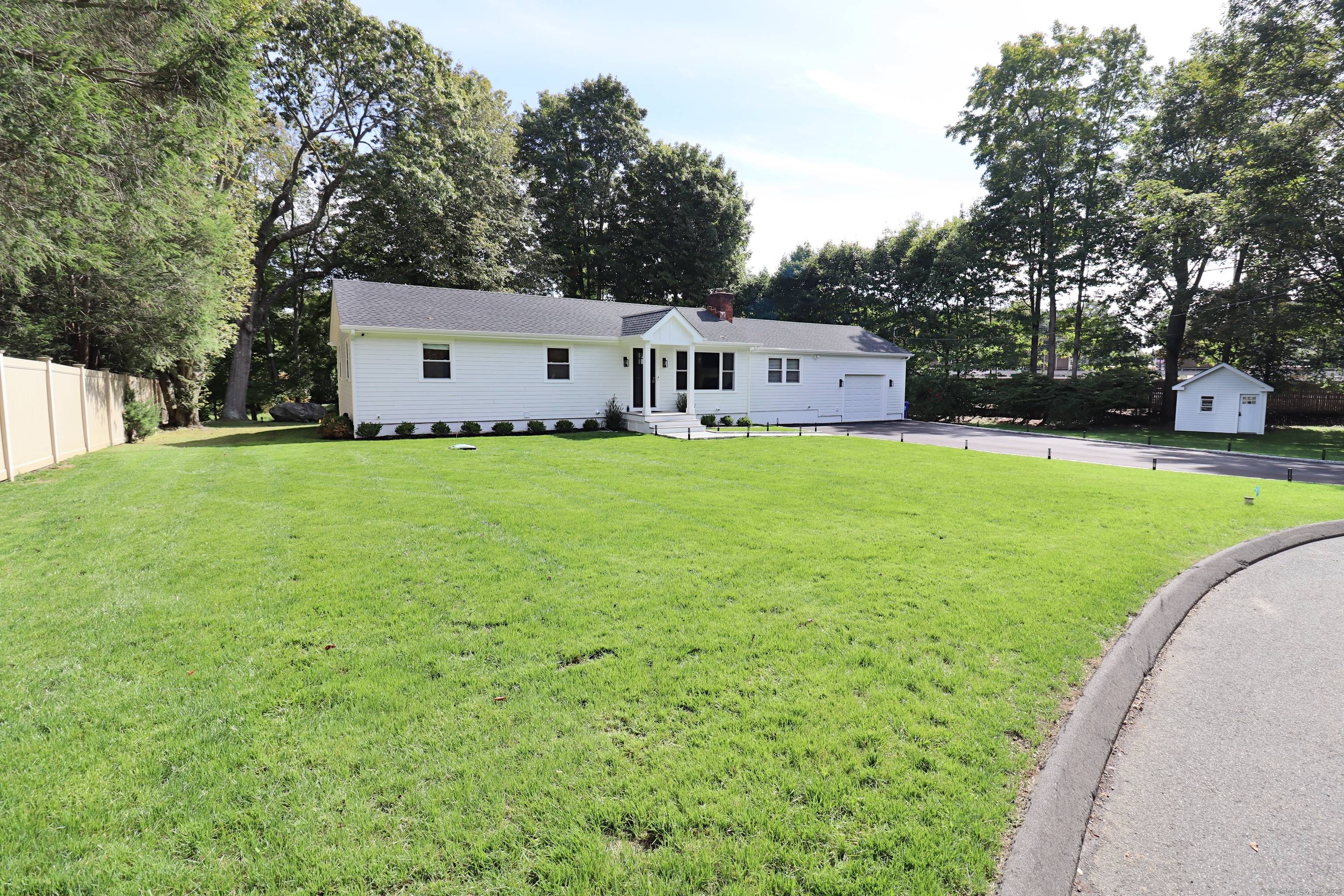Welcome to a refined Elegance Nestled at the end of a cul de sac in Norwalk, the Village of Rowayton.