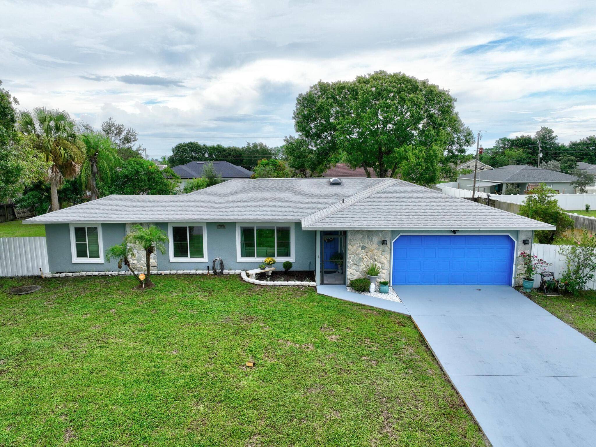 DOUBLE LOT NEW ROOF 2021 NEW IMPACT WINDOWS 2020 NEW APPLIANCES 2021 KITCHEN WITH GRANITE AND WOOD CABINETS MASTER BATHROOM WITH WALK IN SHOWER NEW DOORS 2017 AC 2017 FENCE ...