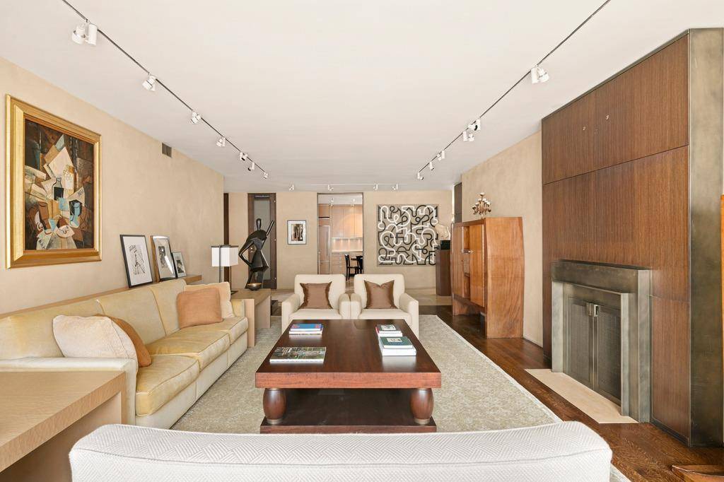 Welcome to Residence 9A, a generously proportioned Classic 7 with sweeping Park Avenue views in the prestigious 700 Park Avenue cooperative.