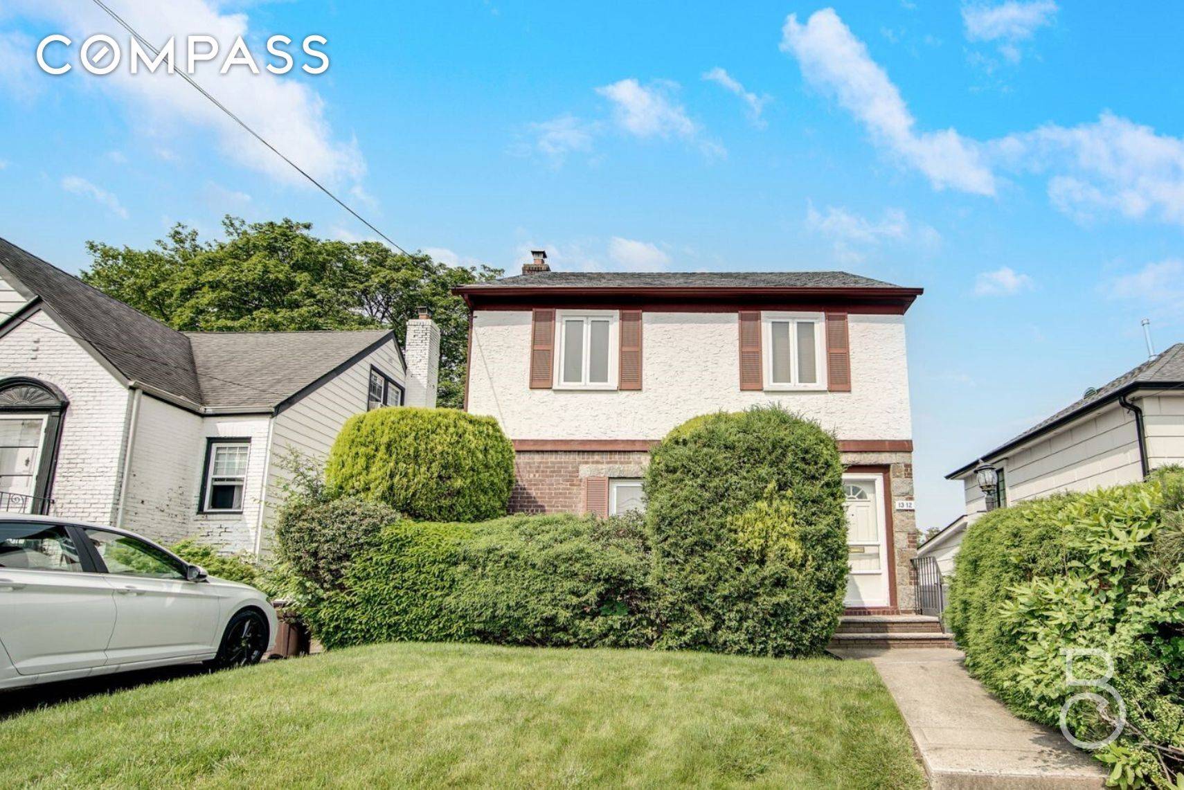 Offering the convenience of Whitestone and the feel of suburban serenity, this home has it all a sunroom, a backyard, and a private driveway included.