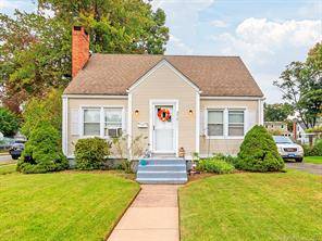 Nice Cape Cod home over 1200sf, with hardwood floors, open living rm dining rm with fireplace.