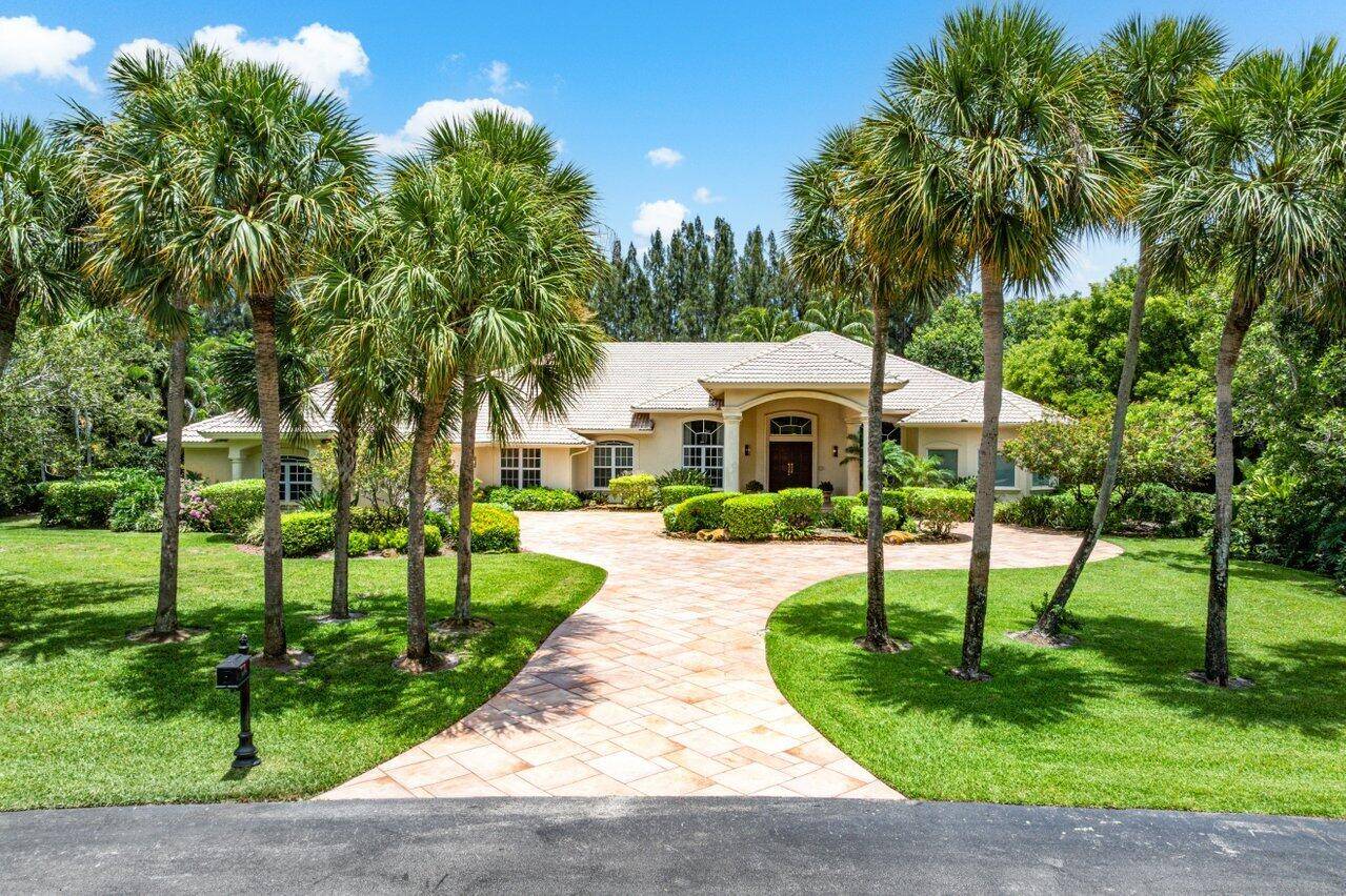 Luxurious 6 bed, 6. 1 bath custom estate including an attached guest house.