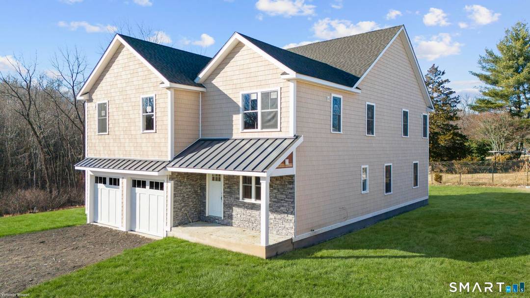 Experience refined new construction in this thoughtfully designed Brookfield residence, where quality craftsmanship meets modern comfort.