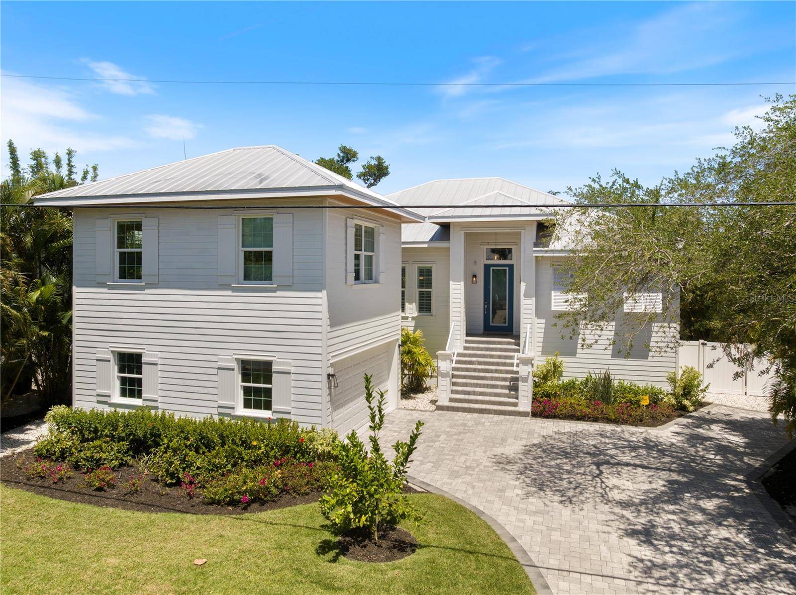 Located on Siesta Key with just a 3 minute walk to Shell Beach, this 2 story home is available NOW FURNISHED for an ANNUAL LEASE.