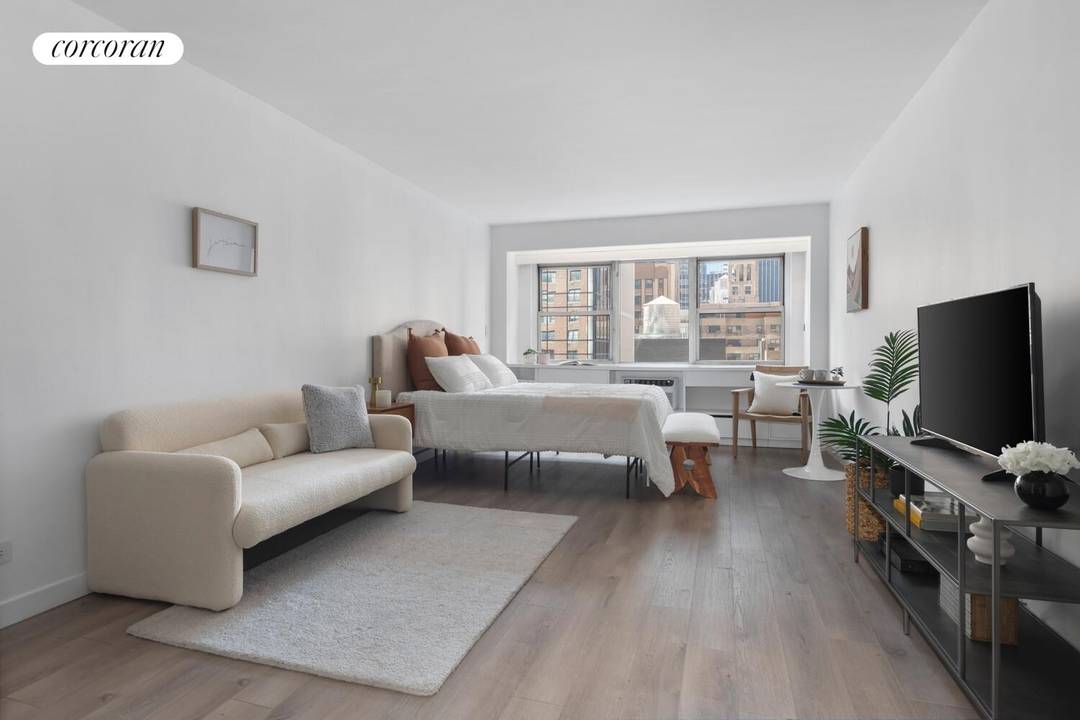 Welcome to Residence 10F at 153 East 57th Street a sun filled studio in the heart of Midtown Manhattan offering comfort, convenience, and modern touches.