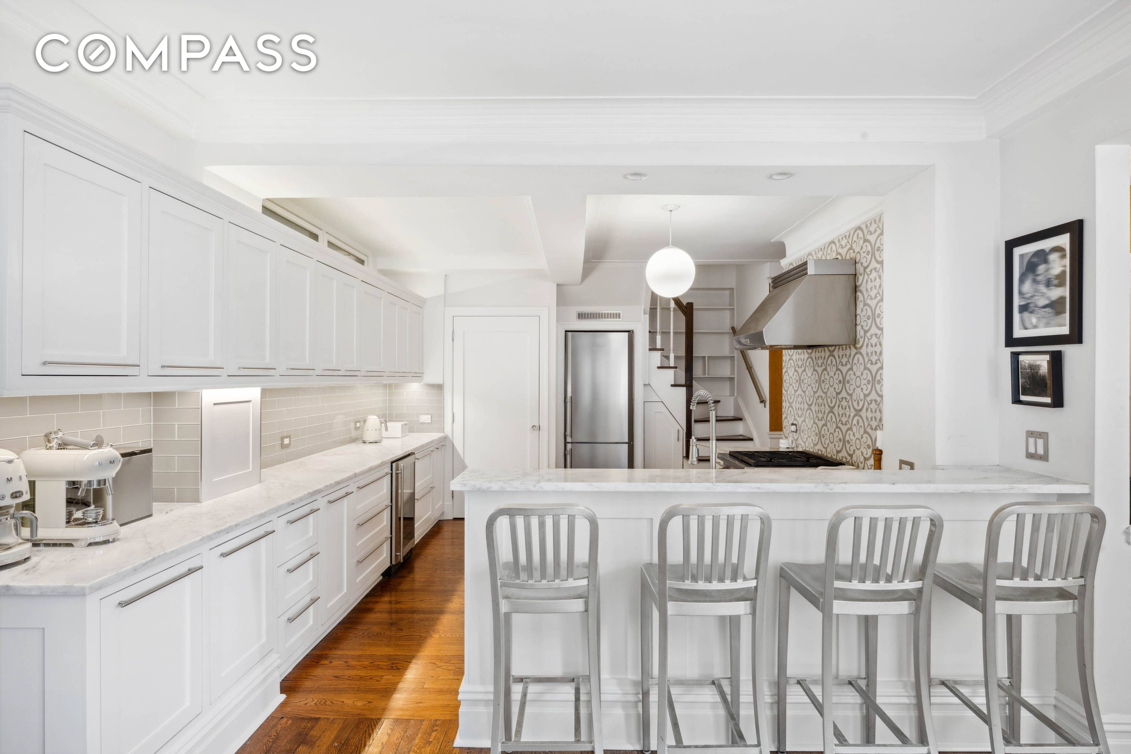 Perched on the upper floors of a charming pre war co op, this updated duplex offers the space and comfort of a townhouse with the ease and security of full ...