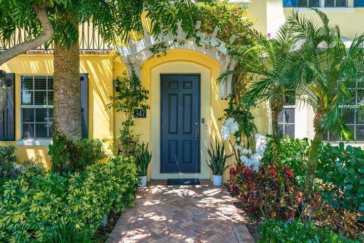 Experience the historic charm of El Cid living in this stunning three story townhome just moments from downtown.