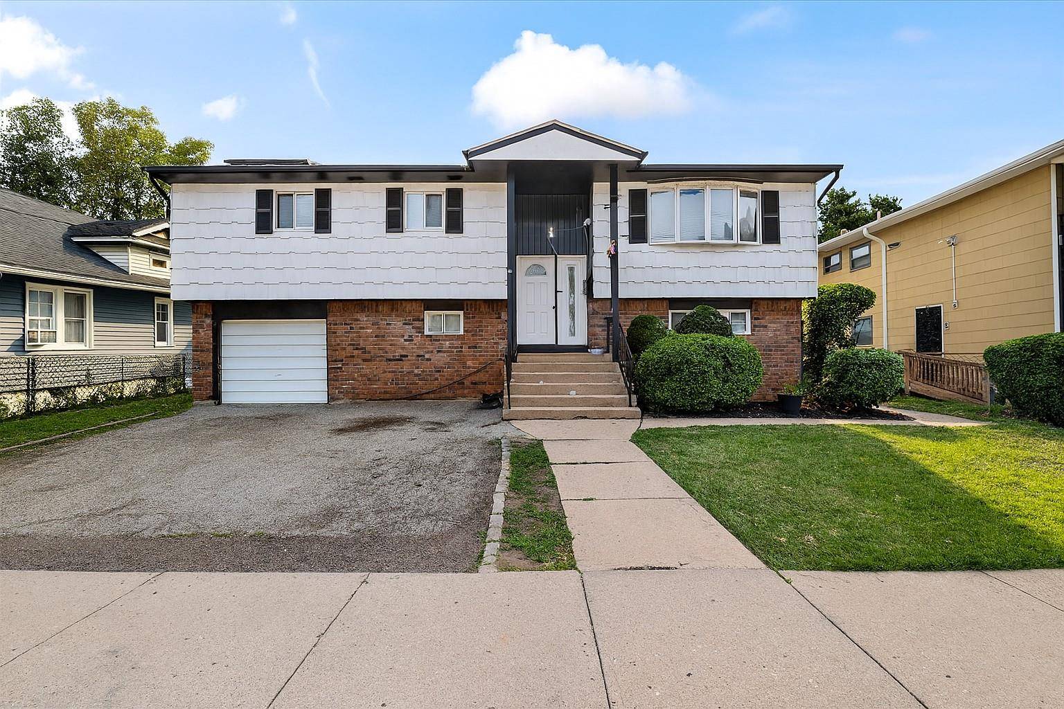 Welcome to 22 Hudson Place a spacious and thoughtfully updated home in the heart of Hempstead !