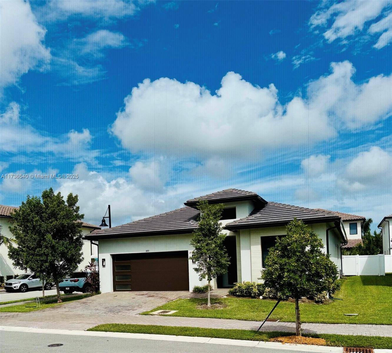 Experience the epitome of luxury living immaculate corner single story, in the sought after Canarias community Downtown Doral.