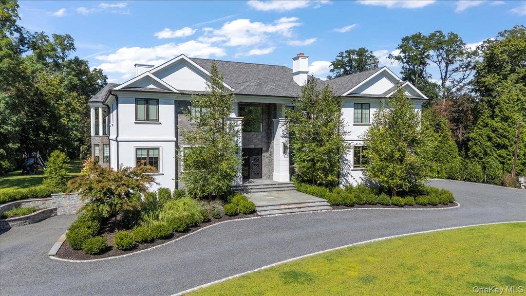 Welcome to 5 Gerry Lane, an extraordinary new construction in the prestigious Village of Lloyd Harbor.