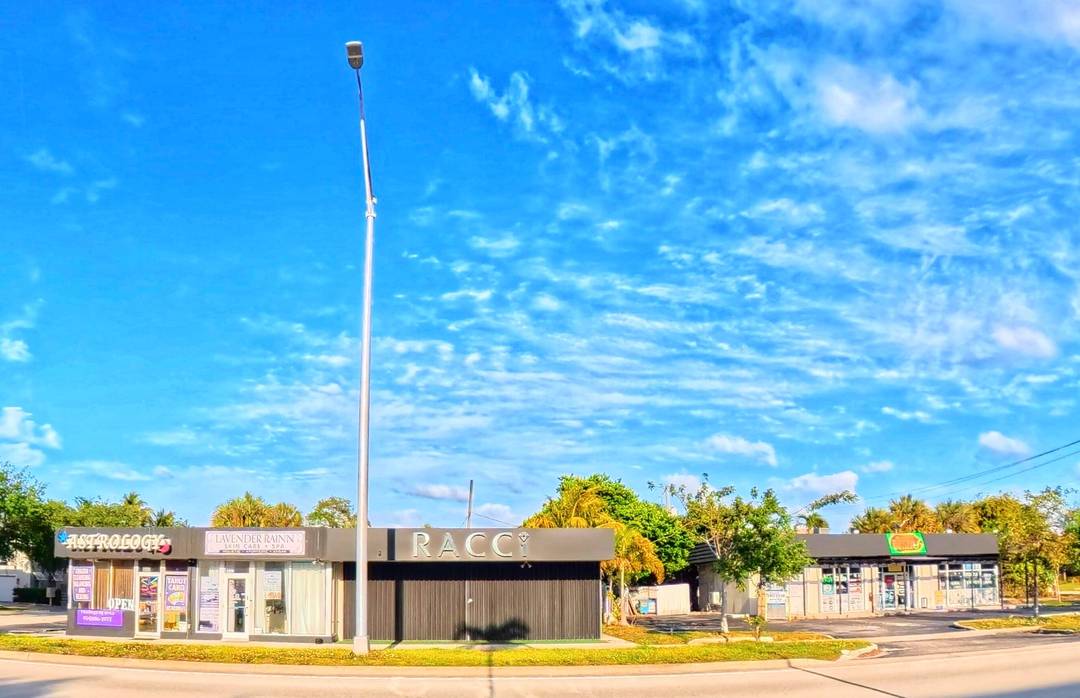 Well maintained plaza generating income with established tenants, including a smoke shop and other retail businesses.