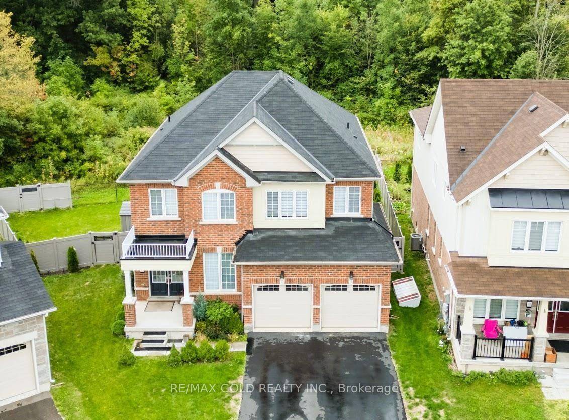 Welcome to this beautifully maintained, less than four year old home situated on a wide, pie shaped premium lot backing onto a scenic ravine.