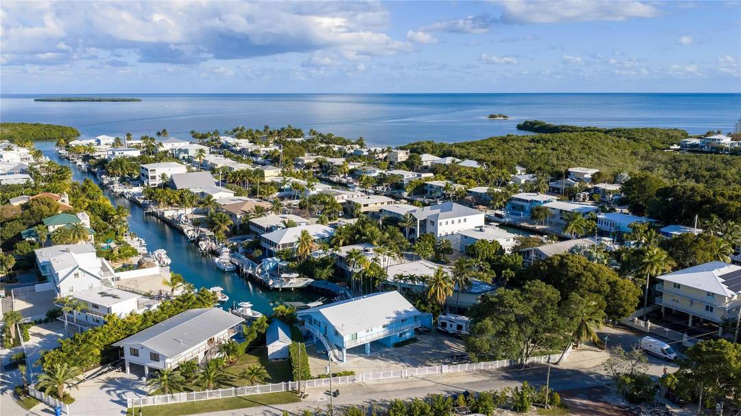 Experience the best of The Florida Keys waterfront living in this thoughtfully recently remodeled 3 bed, 2 bath solid concrete home, including a convenient downstairs bedroom, located just off Tavernier ...