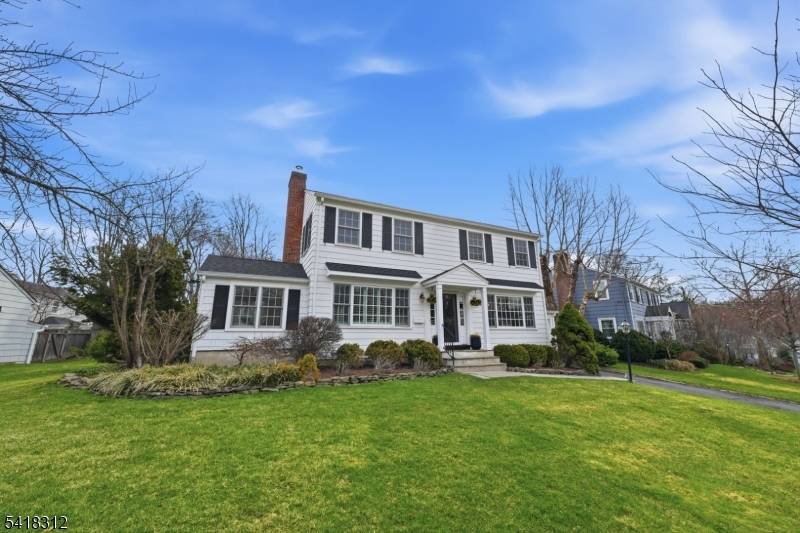 Experience sophisticated suburban living in this impeccably renovated colonial, set on nearly a half acre of lush, level grounds in one of Summit's most coveted neighborhoods.