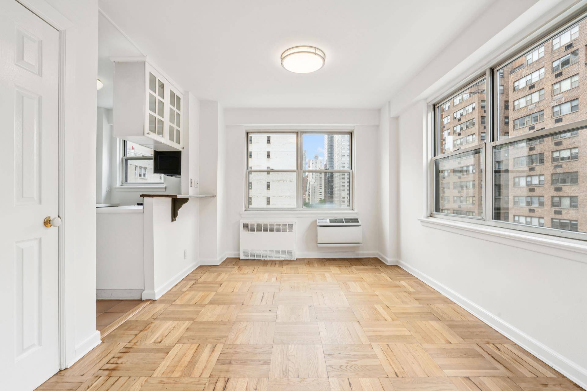Welcome to the charm of 300 E 71st Street, 9G, a corner unit nestled in the heart of Lenox Hill.