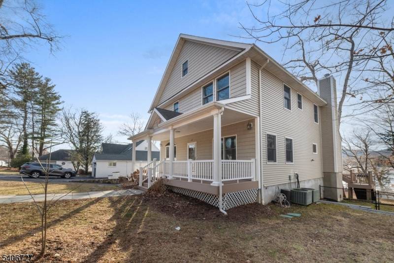 Are you looking for a 4 bedroom 4 full bath lakefront home on the eastern shores of Greenwood Lake in a private lake community with public utilities, private beach, clubhouse, ...