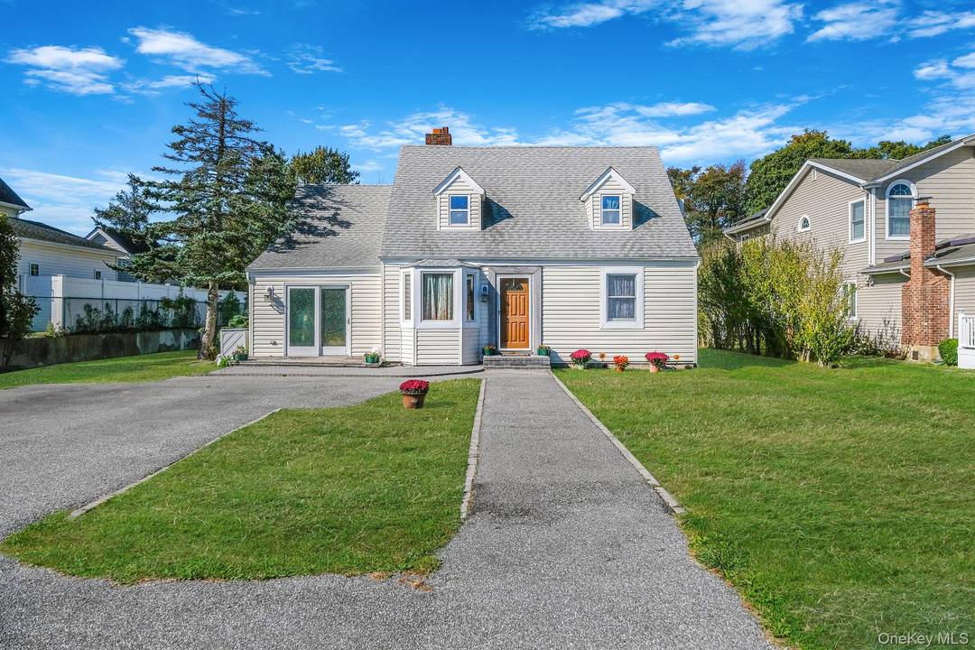 Step into this timeless well maintained Cape home just a short distance from the south shore waters.