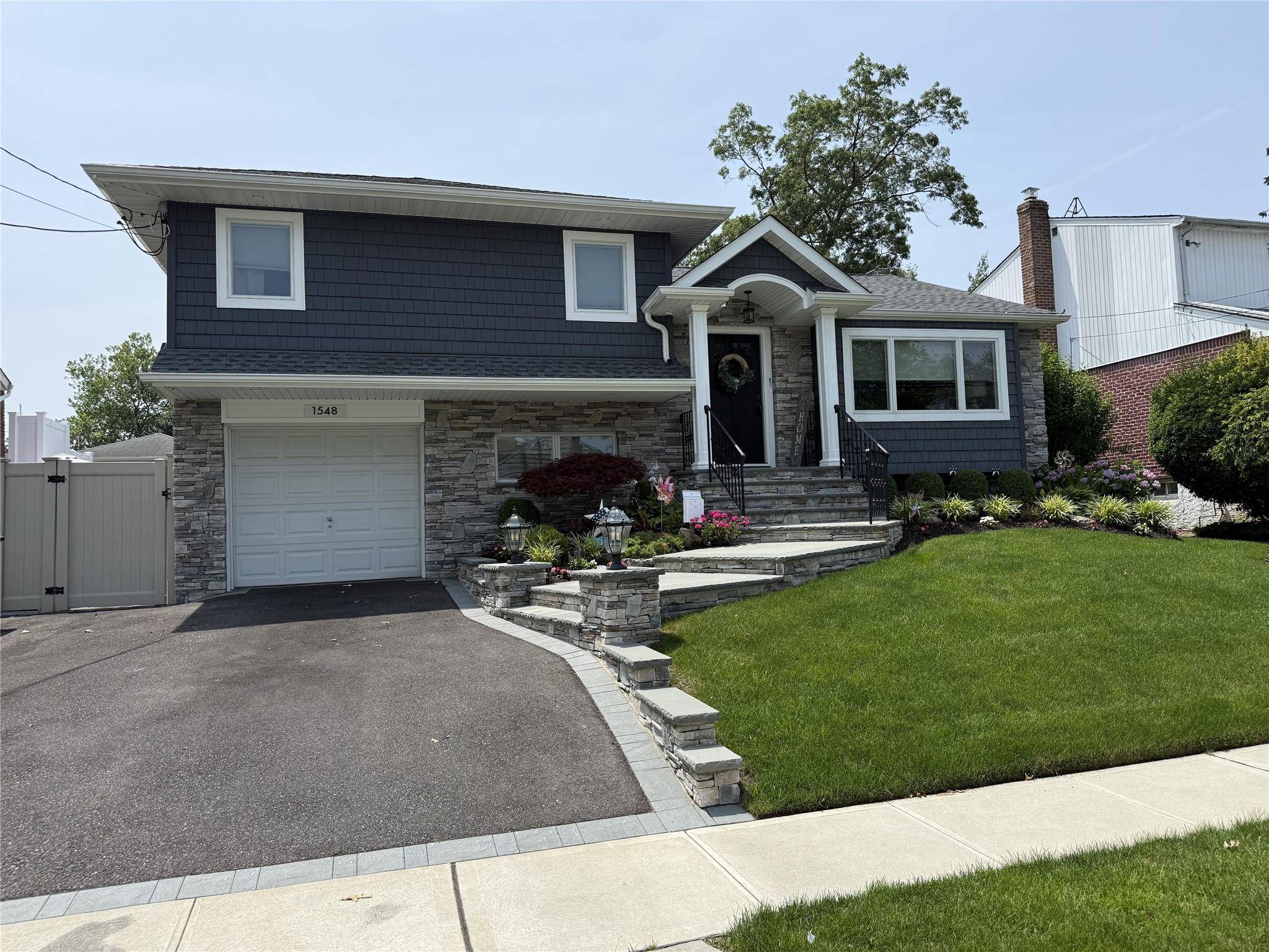 A Rare Find ! This one family beautifully maintained multi level split offers three bedrooms and two bathrooms in a custom, thoughtfully designed layout.