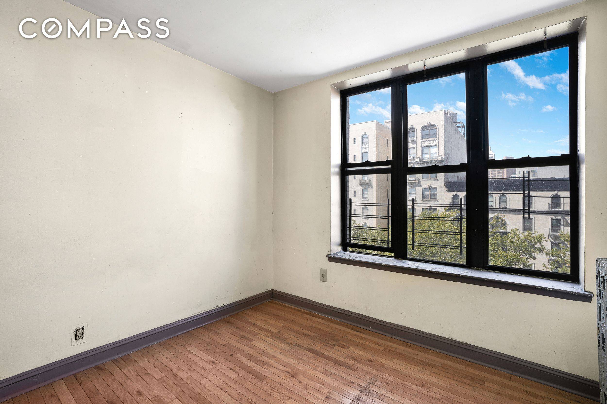 Top floor 3BR 1BA with big, open views over Adam Clayton Powell Blvd.
