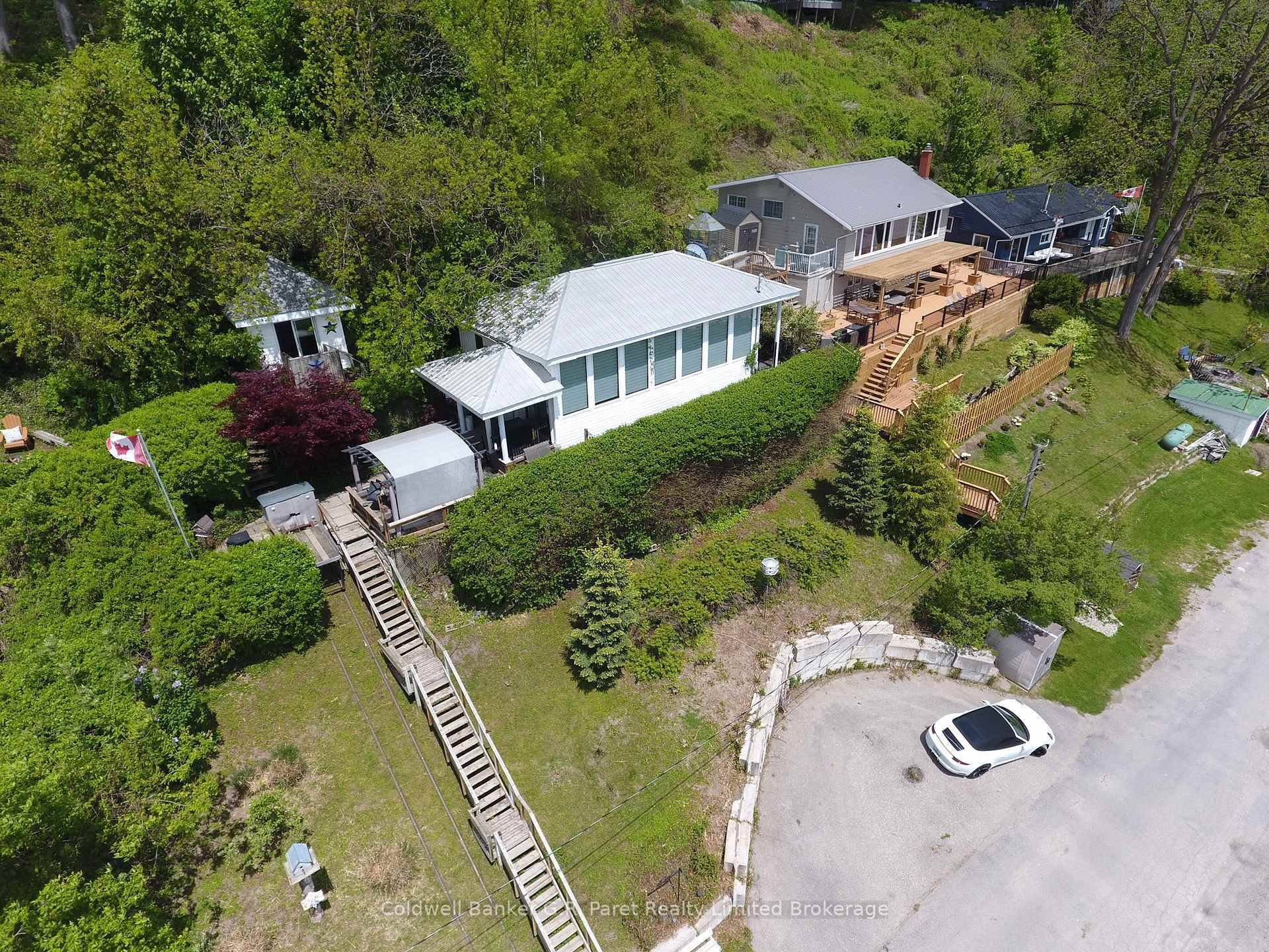 Nestled on a scenic hillside between Long Point and Turkey Point, this charming, fully furnished 4 season cottage offers breathtaking views of the tranquil bay.