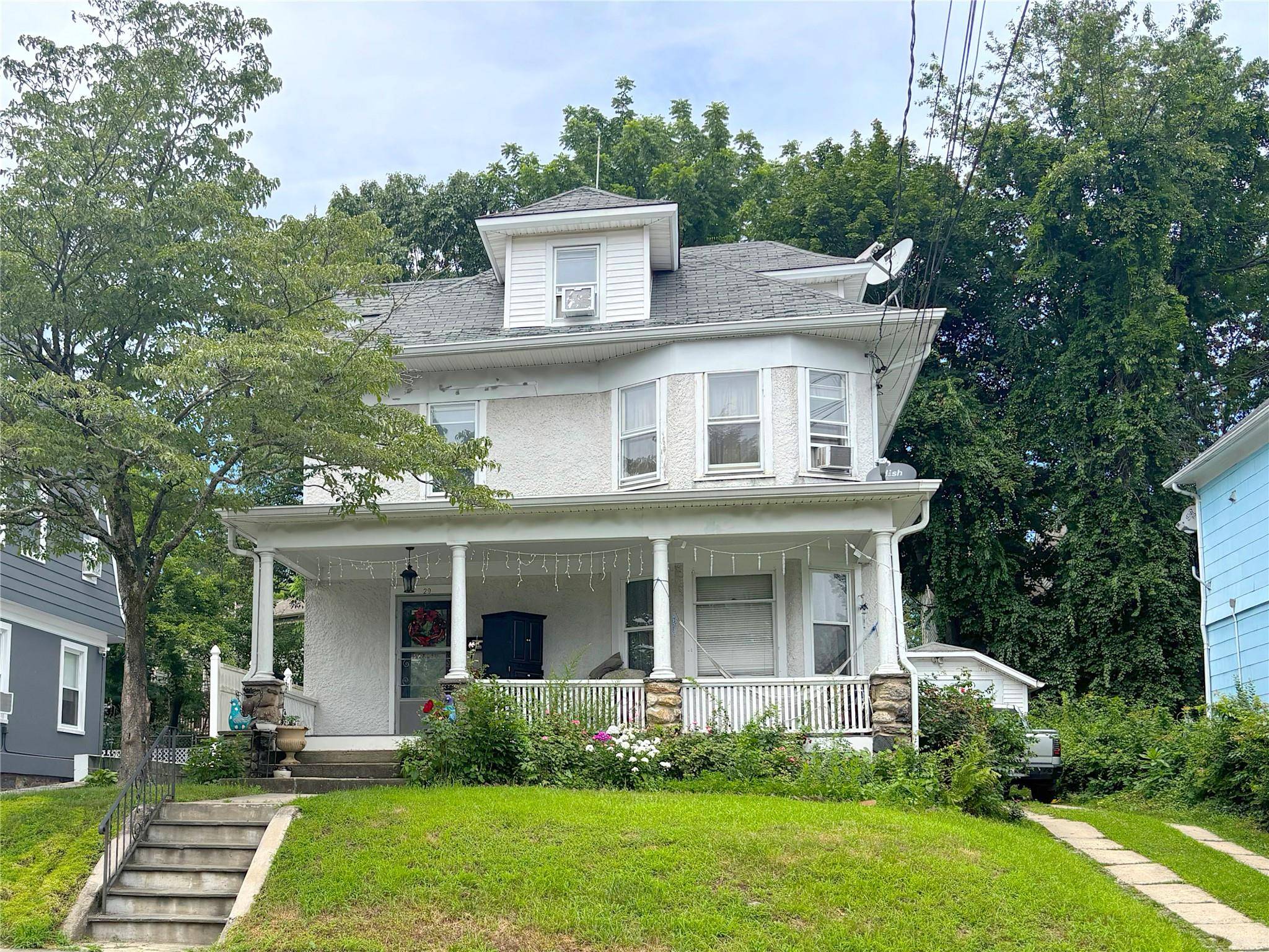 Welcome to this classic 4 bedroom Colonial, perfectly situated on a picturesque tree lined street just steps from Lyons Park.