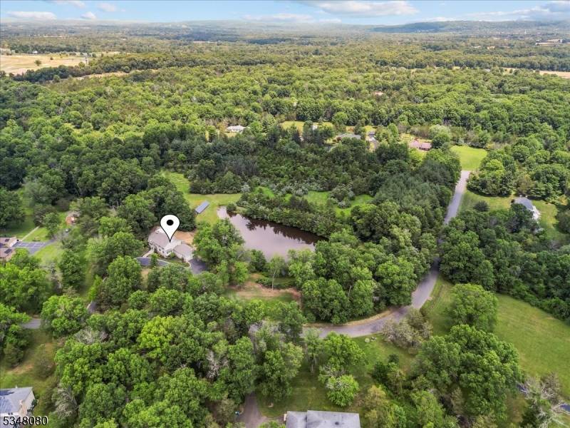 Set on a breathtaking 5 acre lot, this custom renovated Colonial offers over 4, 500 square feet of refined living space.