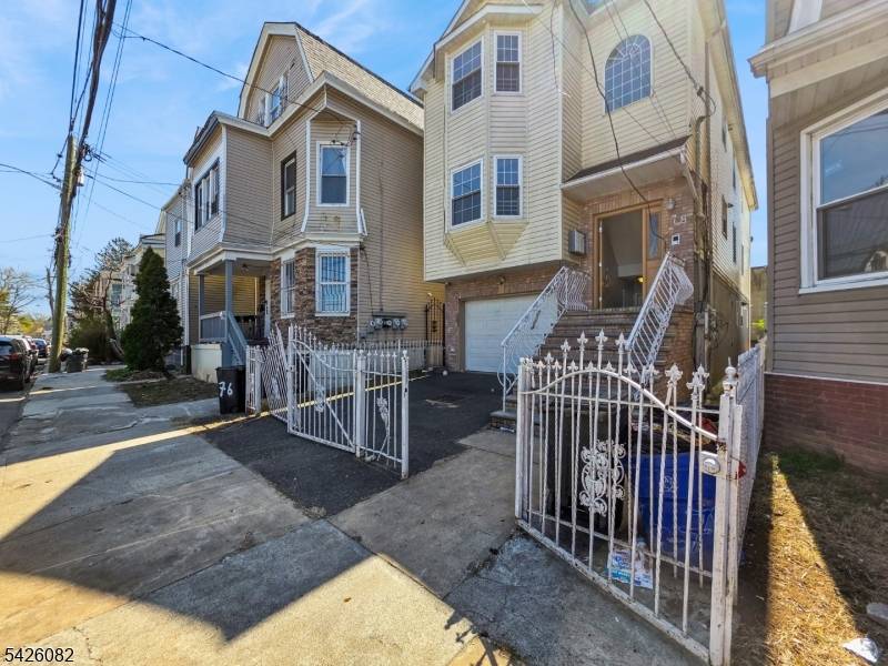 Welcome to this 22 year young contemporary 2 Family home, offering space, versatility, and an enhanced lifestyle.