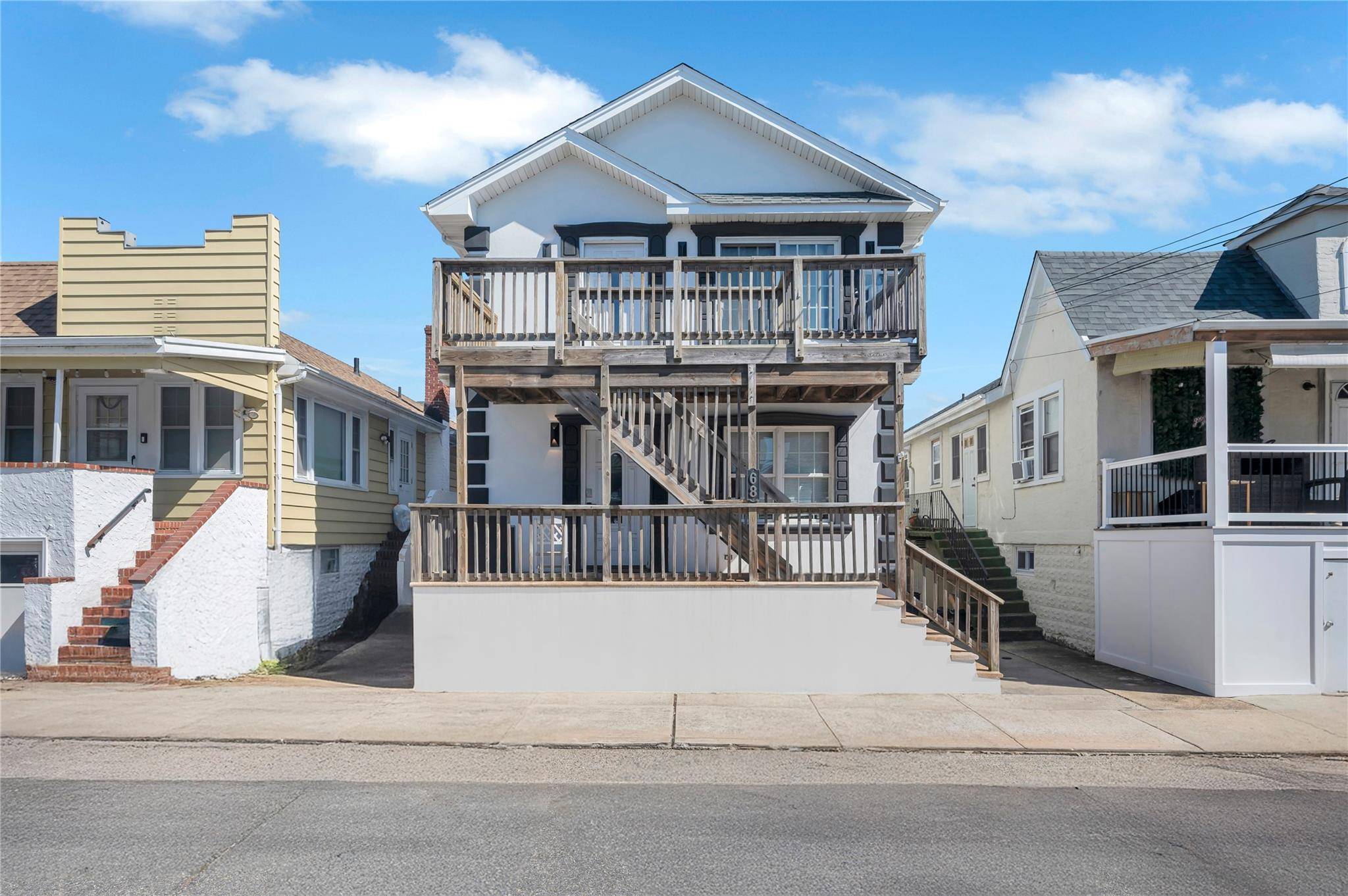 Magnificent Two Family in private Beach Community.