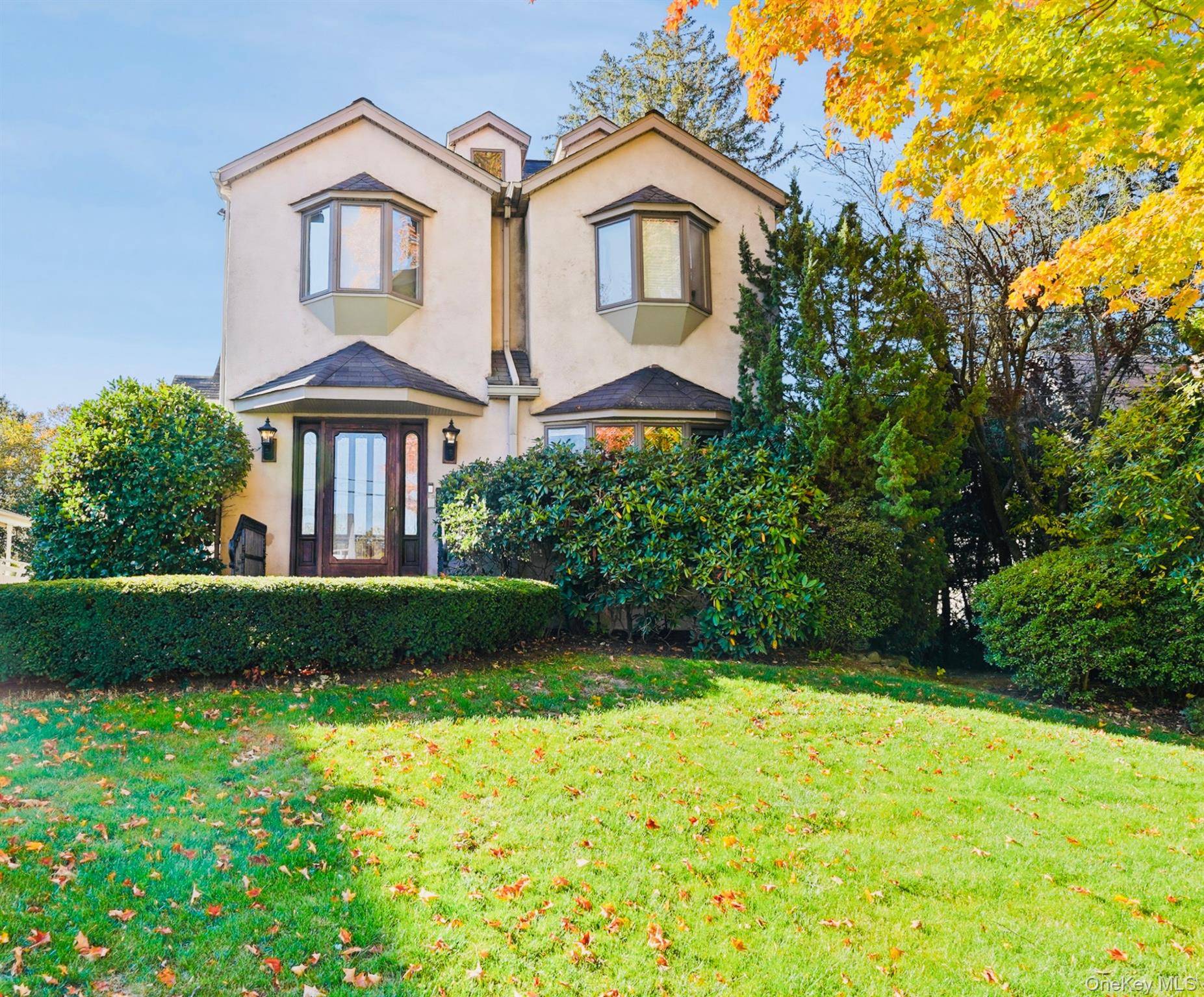 Impeccably maintained and beautifully updated Colonial featuring an ideal open floor plan perfect for modern living and entertaining.