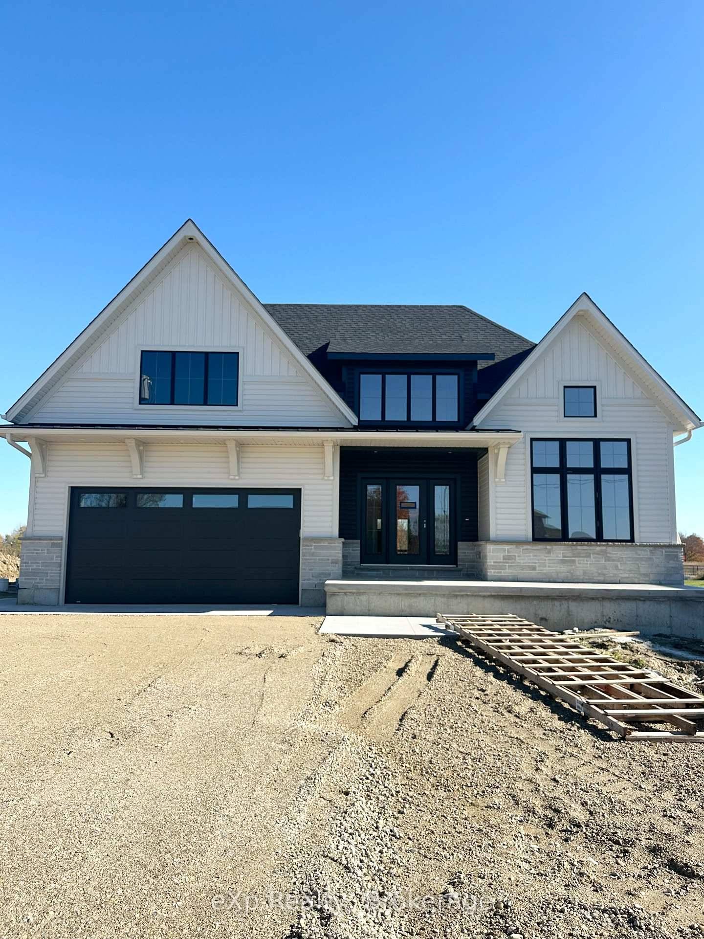 This custom designed estate home is tucked away on a quiet dead end street in one of Listowel's most coveted neighbourhoods, where privacy, prestige, and modern elegance meet.