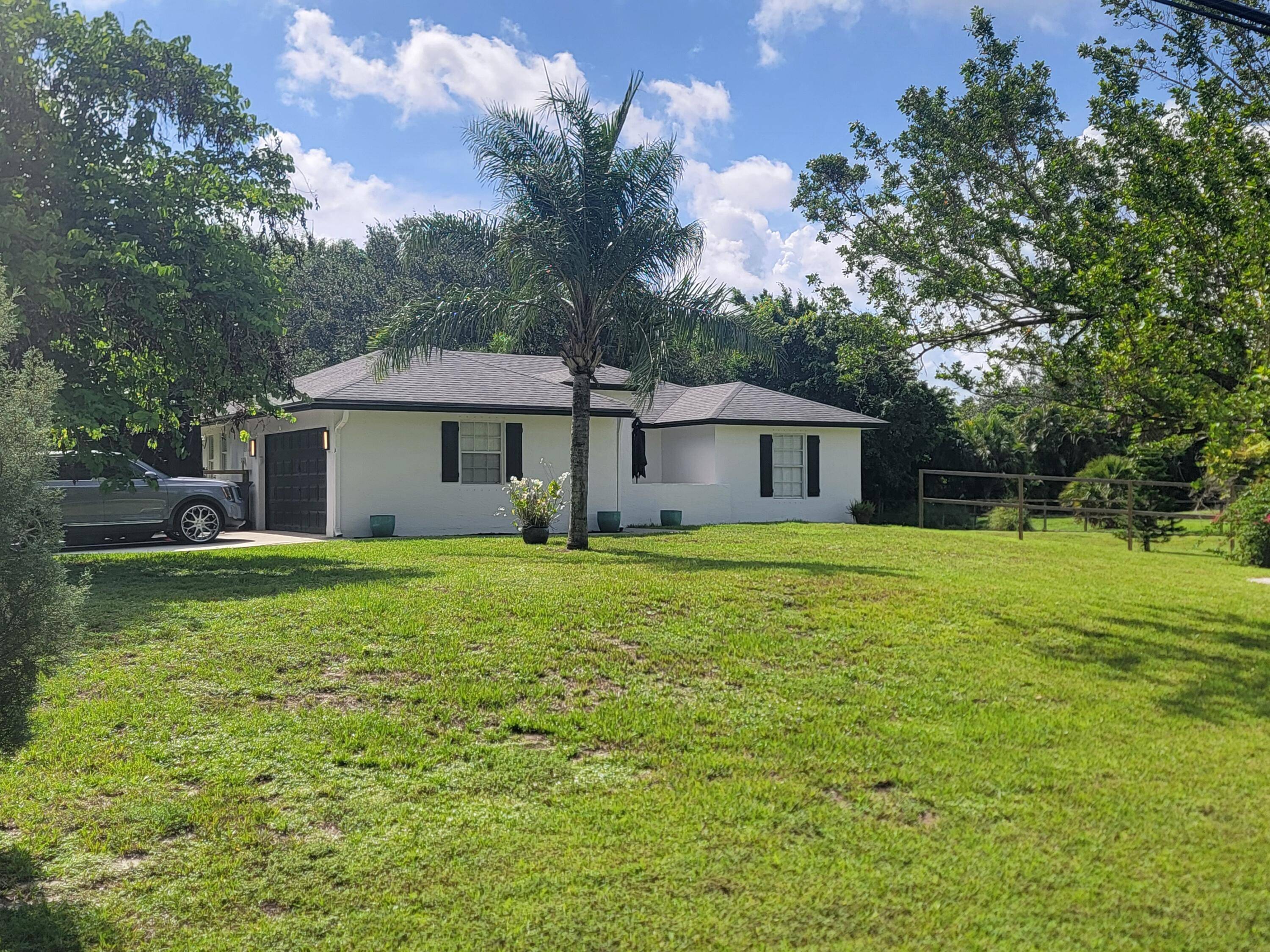 Check out this beautifully updated 3 Bedroom 2 bath 2 car garage home situated on 1.