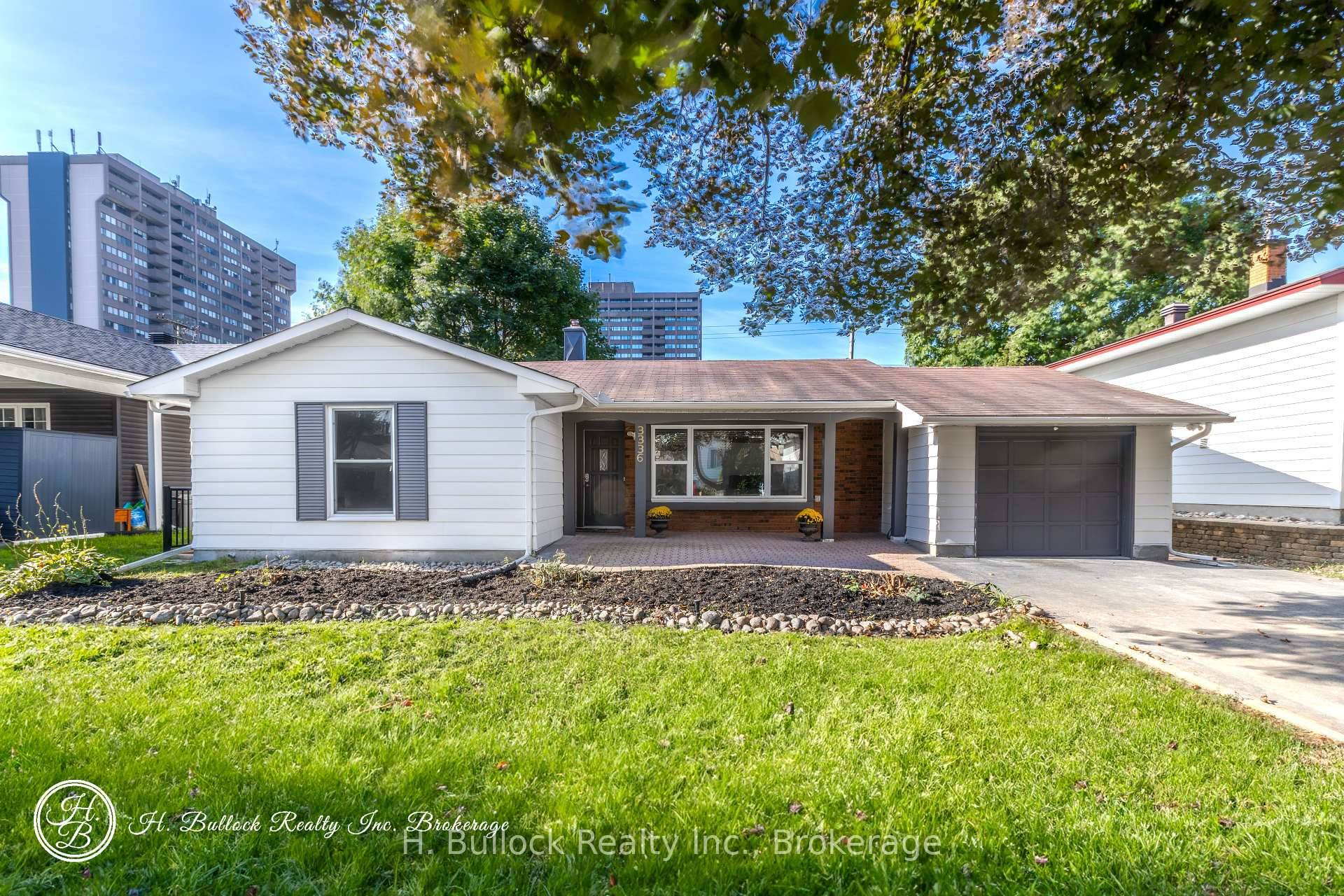 New Price Charming Renovated Bungalow Converted into Legal Duplex Ideal Investment or Multi Generational Living.