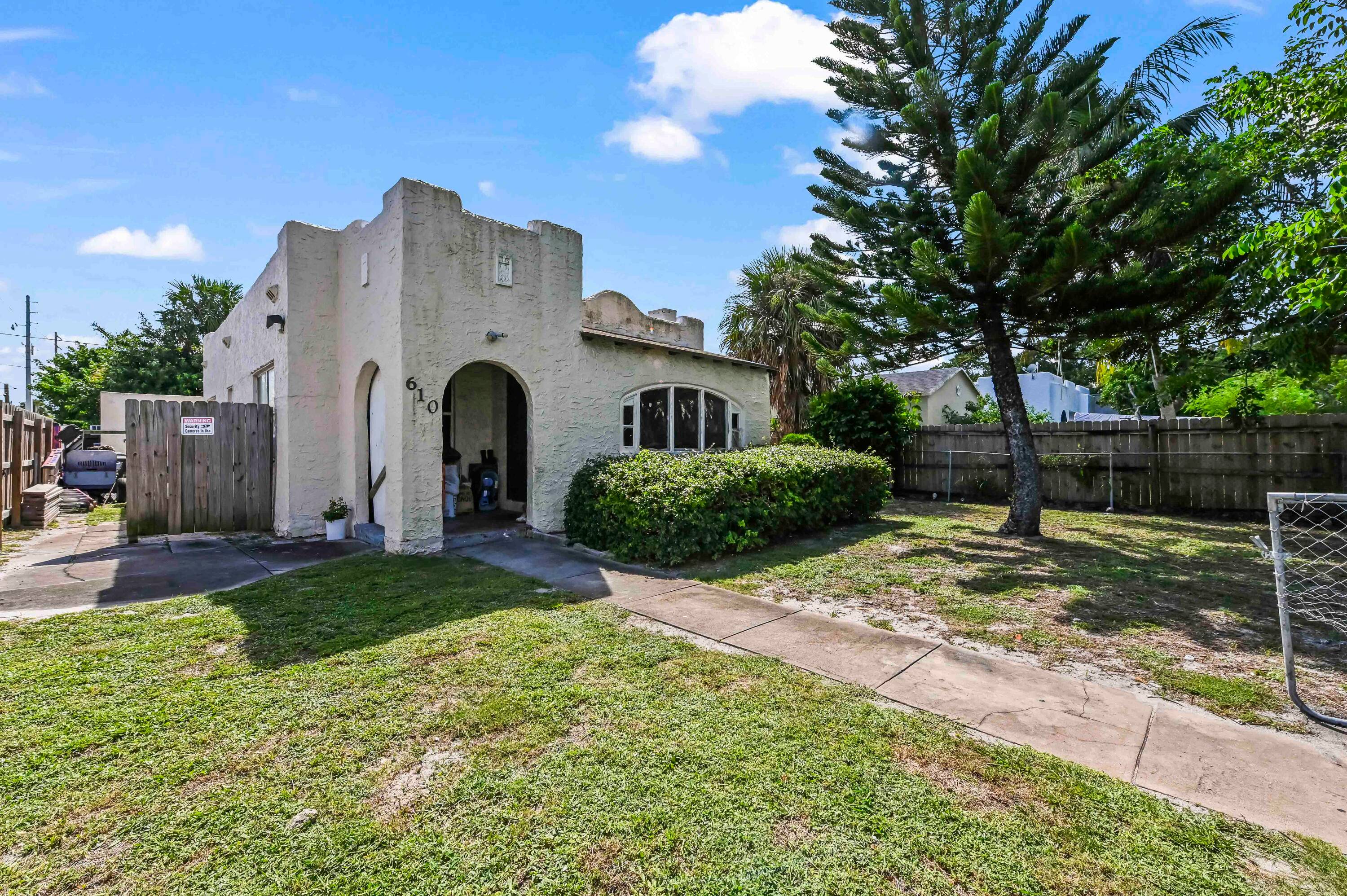 A phenomenal investment opportunity awaits with this charming, fully rented Spanish style duplex, ideally situated in the highly desirable Northwood neighborhood.