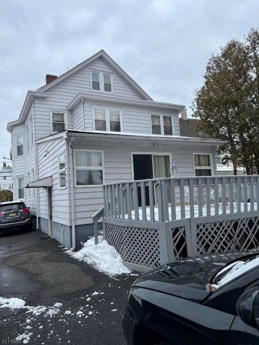 Expanded first floor with a family room and deck.