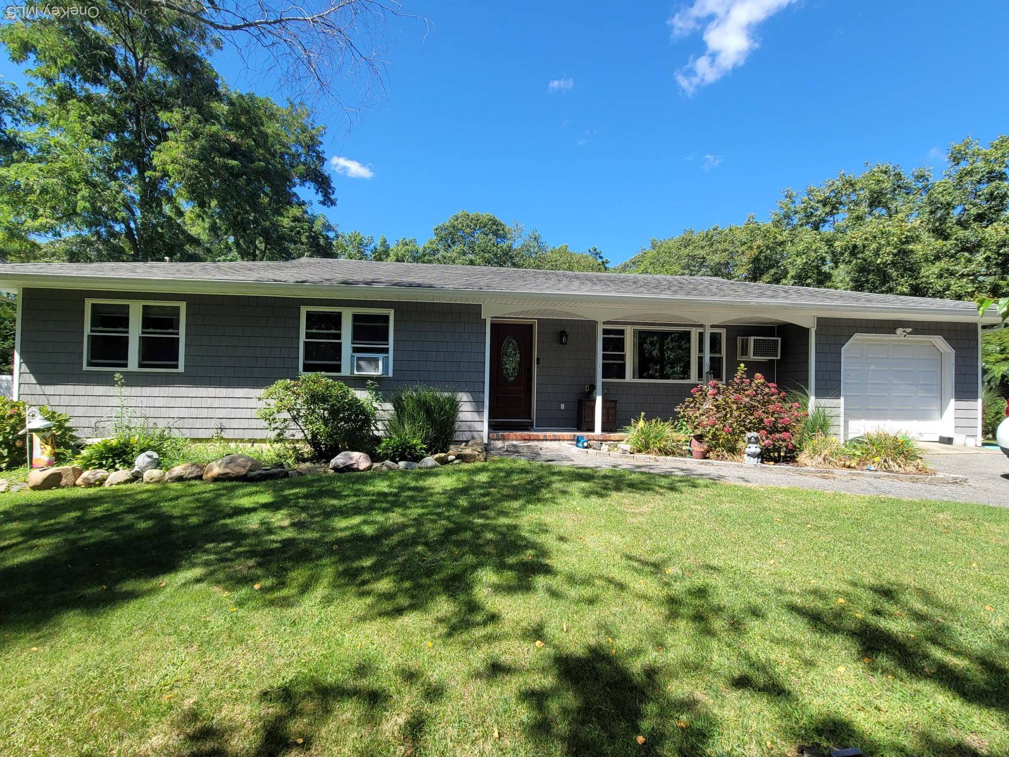 Welcome to this beautifully 3 bedroom, 2 bathrooms ranch nestled on a spacious 0.