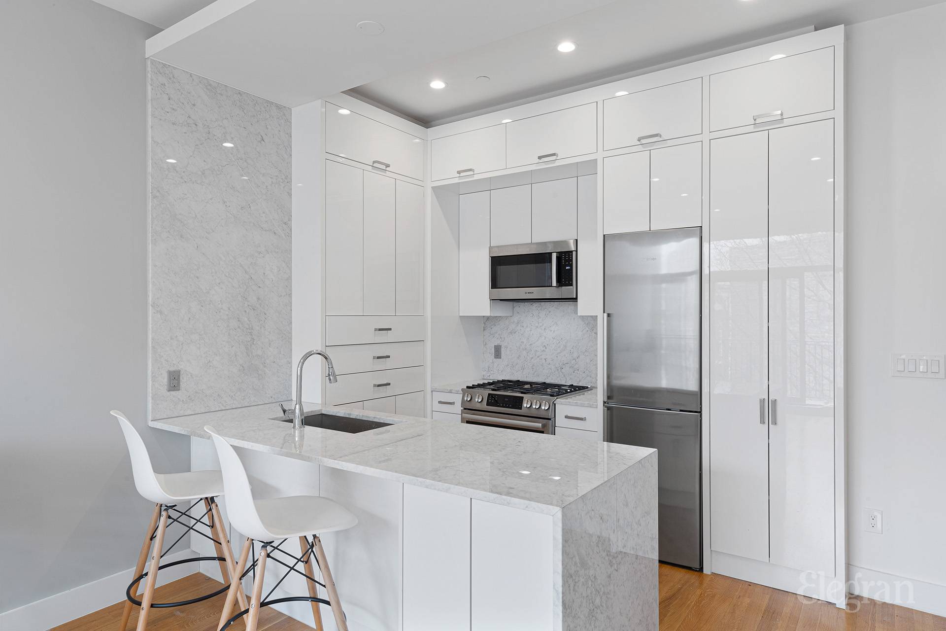 Welcome to your serene sanctuary at Belvedere LXXXVIII, an exclusive boutique condominium with just seven thoughtfully designed residences.